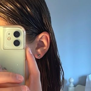 Earrings, they are moons with some sort of chain